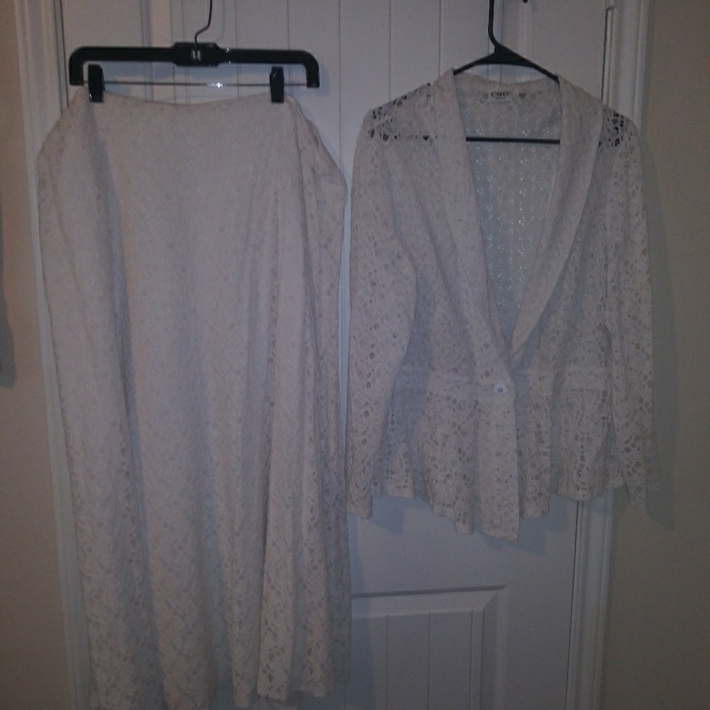 2 piece Sumner white eyelet suit.